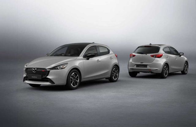 Two silver Mazda 2 cars, front and rear views displayed.