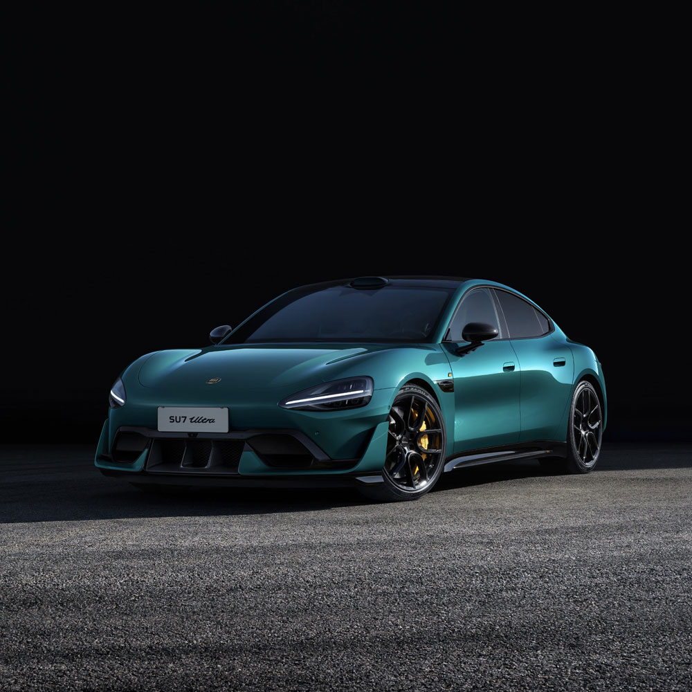 A teal SU7 Ultra car parked on a gravel road against a black background.