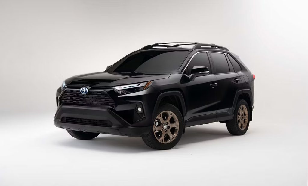 A black Toyota SUV with bronze - colored wheels, presented against a plain white background.