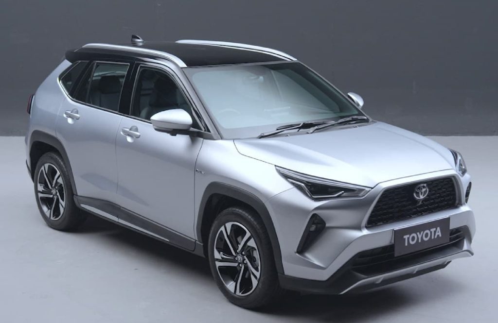 A silver Toyota SUV showcased against a plain gray background