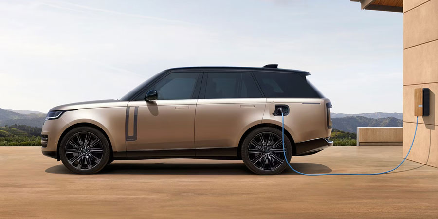 Parked 2025 Range Rover charging at the phev station point