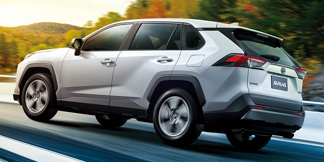 Rear side view of a 2020 Toyota RAV4 while driving