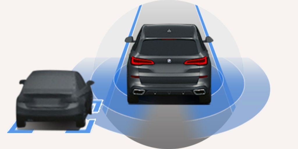 2025 BMW X with sensor range: detects adjacent car, lane markings—driver-assist tech graphic.