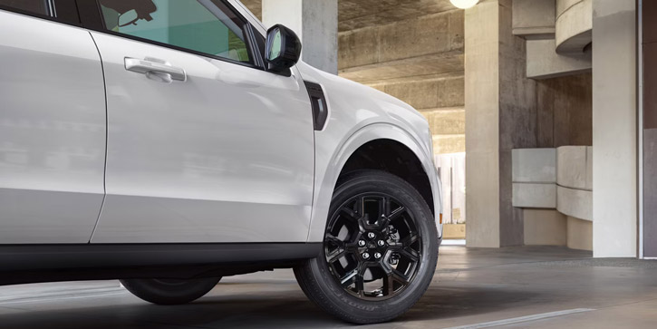 Side view of the passenger door and wheel of a 2026 Ford Maverick pickup