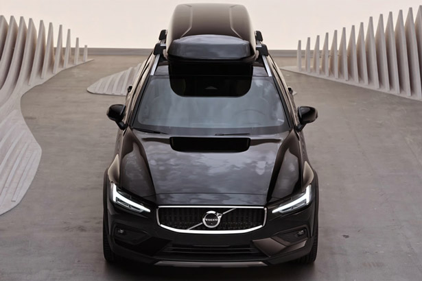 Exterior front view of the 2026 Volvo V60 Cross Country and roof box.