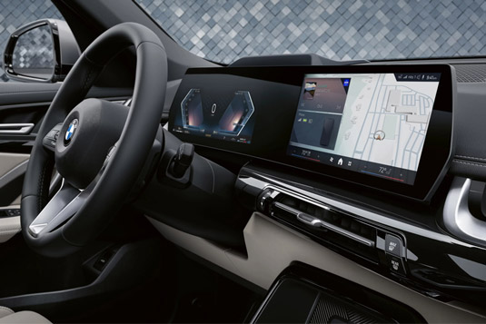 Interior shot of the 2026 BMW X1's dashboard with Curved Display