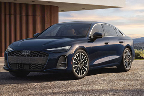 Three-quarter view of the front side of a blue 2026 Audi A6