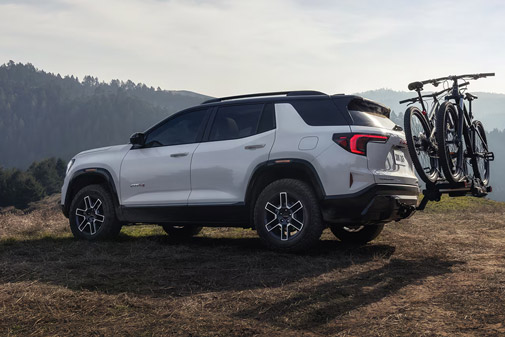 Profile View of the 2026 GMC Terrain AT4 Small Off-Road SUV with a Bike Rack Attached