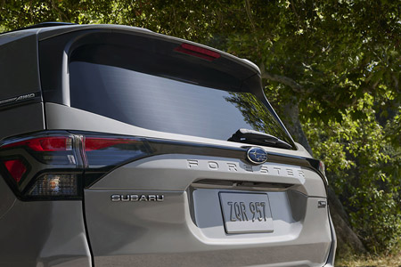 Rear view of the 2026 Subaru Forester in River Rock Pearl color