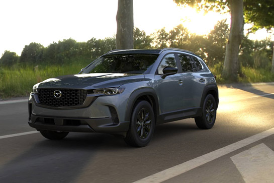Three-quarter view of the front side of the 2026 Mazda CX-50