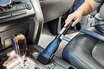 Use a vacuum cleaner to clean up any debris that has fallen into your car