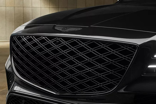 Close-up of the grille details of the 2026 Genesis GV80 Prestige Black