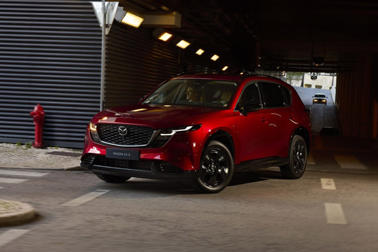 2026 Mazda CX-5 turning on a city street