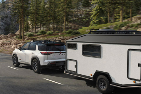 2026 Nissan Pathfinder towing a trailer
