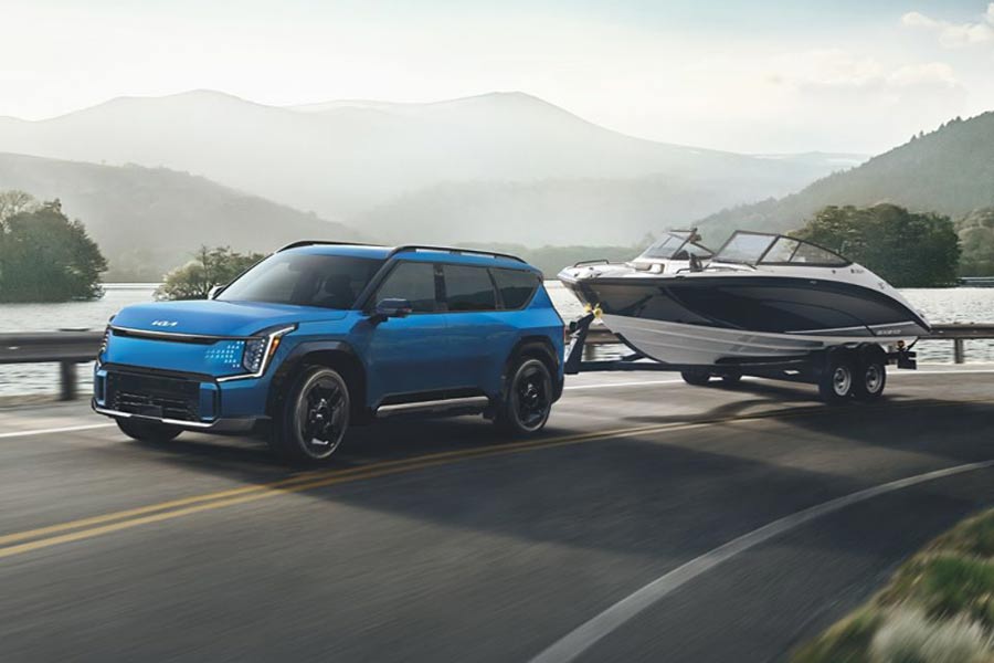 A 2026 Kia EV9 towing a boat