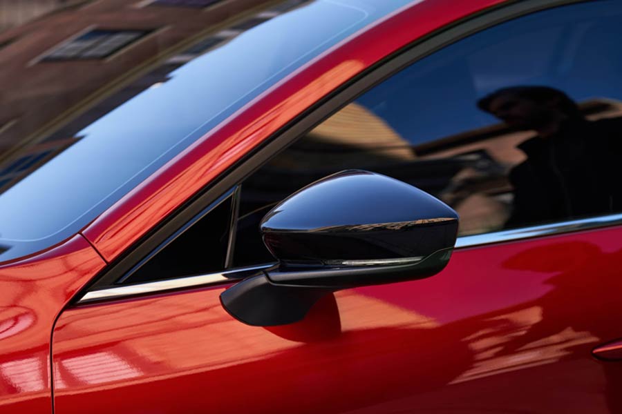 Close-up of the rearview mirror of the 2026 Mazda 3 hatchback