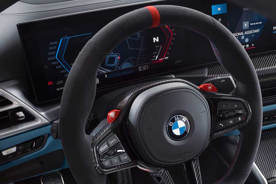 Close-up of the steering wheel of the 2027 BMW M4 Coupe