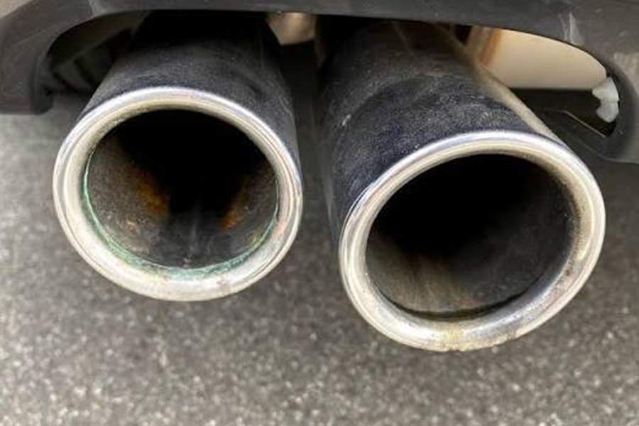 Rust and carbon buildup in car exhaust systems